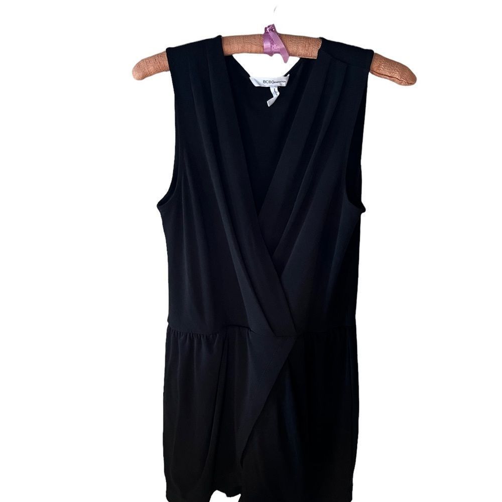 BCBG   G eneration Bl Sm deep V-neck romper  Elastic waist 96% poly/ 4% spandex